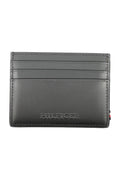 cdn.stockfirmati.com/catalog/31016/tommyhilfigerportafogliouomonero_1.jpg